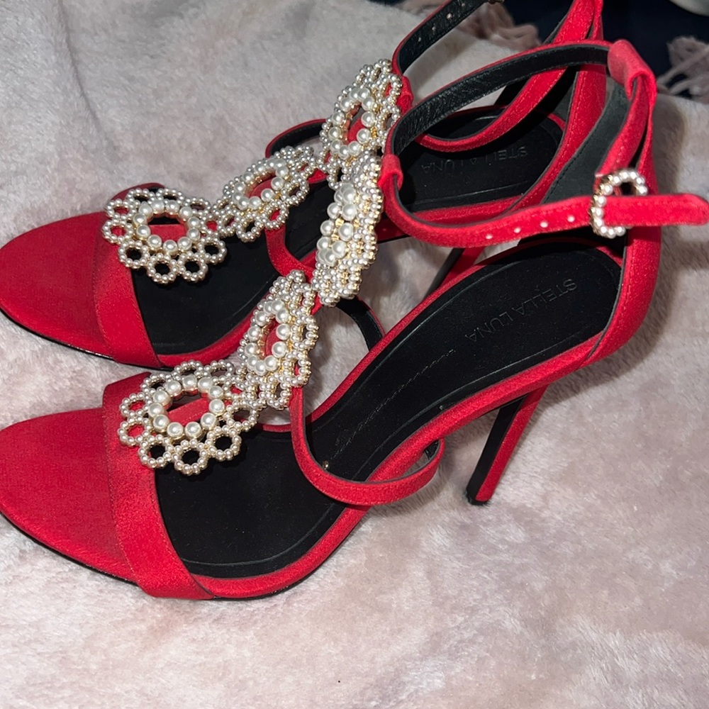 Red heels with pearl straps